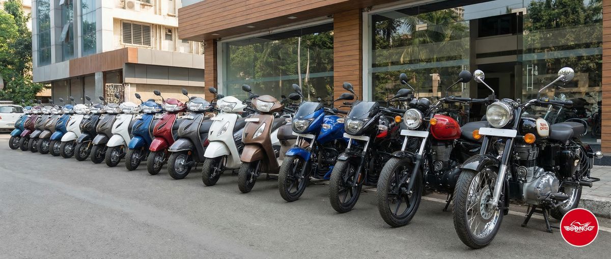 Row of clean well-maintained rental bikes and scooters at a bike rental shop in Pune