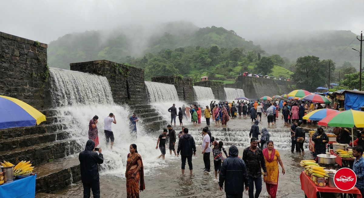 Bhushi Dam Lonavala waterfall with cascading water over stepped dam walls