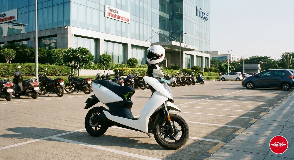 Scooty parked at Hinjewadi IT park with helmet on handlebar ready for commute